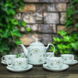 Bộ ấm chén sứ CK quai cong hoa xuyến chi (Trắng)