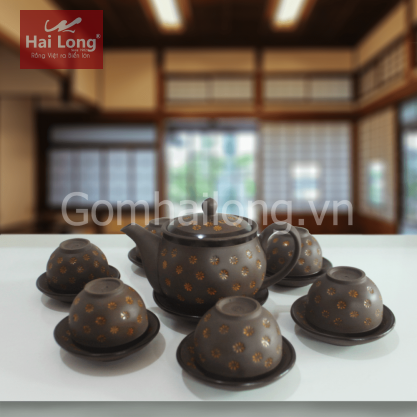Bộ ấm chén tử sa ngàn hoa vàng quai tròn bầu