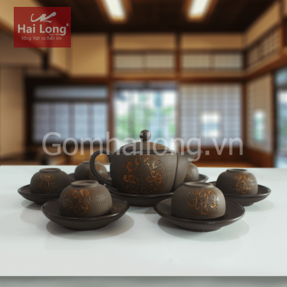 Bộ ấm chén tử sa mai vàng bé quai tròn bầu